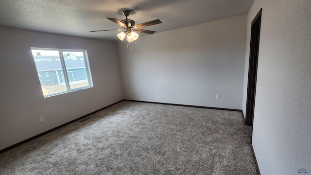 424 Yelner Dr Lot 38Blk 4, Box Elder, SD 57719 - carpeted empty room featuring a ceiling fan and baseboards