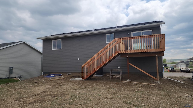 424 Yelner Dr Lot 38Blk 4, Box Elder, SD 57719 - back of property with a wooden deck and stairs