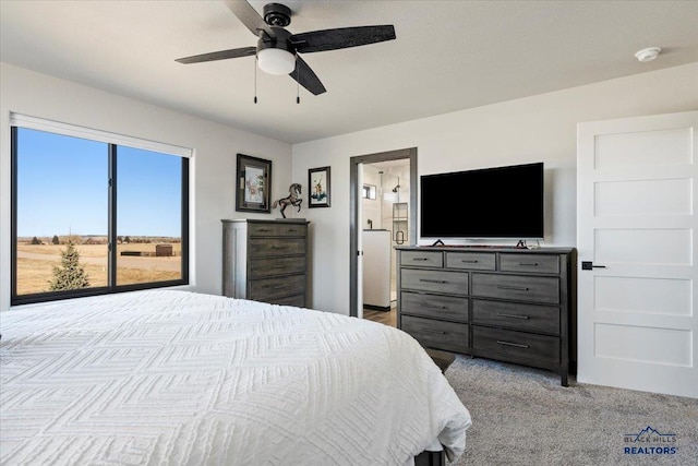 bedroom with ceiling fan and carpet flooring