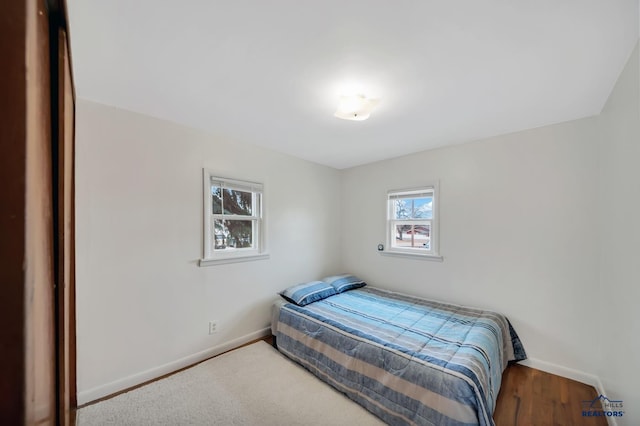 bedroom featuring baseboards