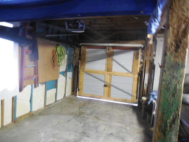 garage featuring a garage door opener