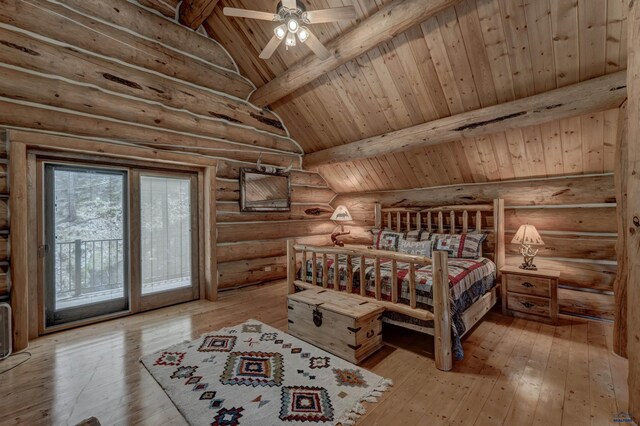 bedroom featuring access to outside, beamed ceiling, wood ceiling, and hardwood / wood-style floors