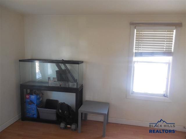 710 Haines Ave, Rapid City, SD 57701 - miscellaneous room featuring wood finished floors and baseboards