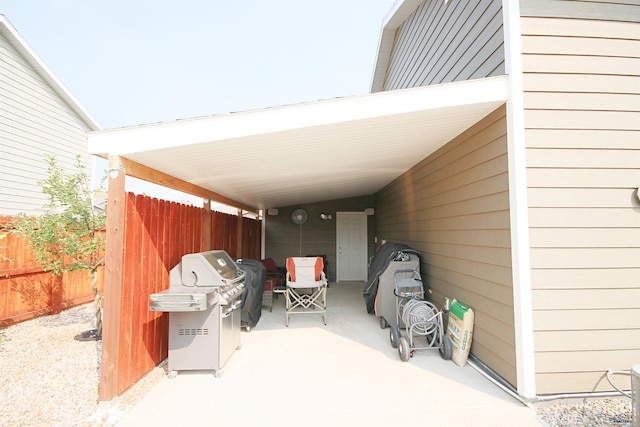 view of patio featuring fence and grilling area