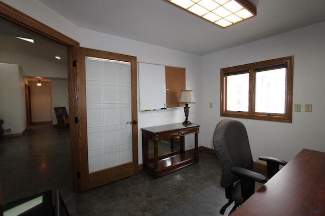 office featuring visible vents and baseboards