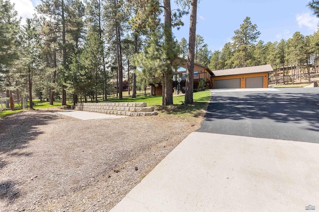 view of front of home featuring driveway and a garage
