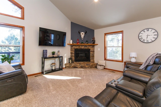 living room with visible vents, carpet floors, a fireplace, baseboards, and vaulted ceiling