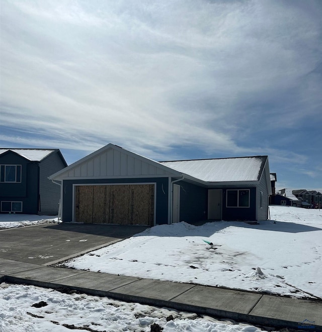 view of front of house with a garage and board and batten siding