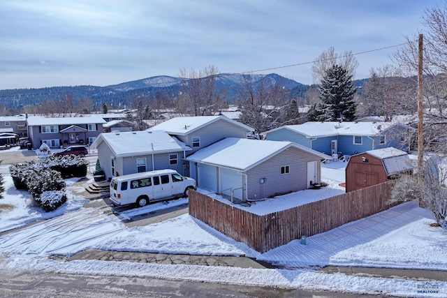 1401 Blacktail Dr, Sturgis, SD 57785 - snowy aerial view featuring a residential view and a mountain view