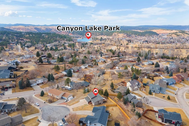 bird's eye view featuring a mountain view and a residential view