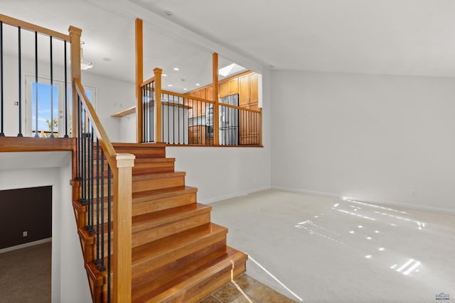 stairs with carpet and baseboards