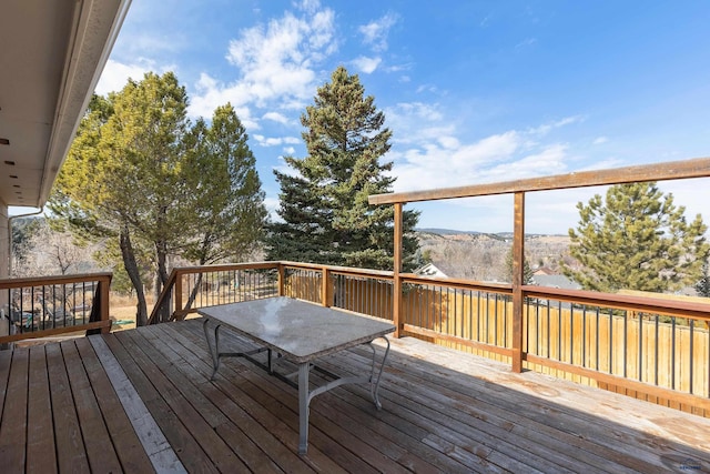 wooden terrace featuring a mountain view