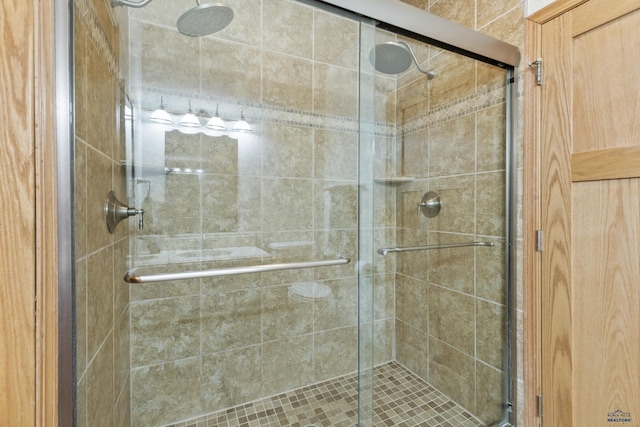 full bathroom featuring a shower stall