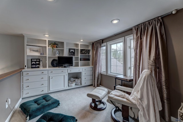 living area featuring carpet flooring, recessed lighting, and baseboards