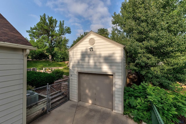 detached garage with fence