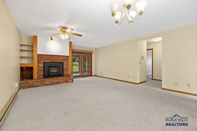 unfurnished living room with carpet, baseboards, a baseboard radiator, a fireplace, and ceiling fan with notable chandelier