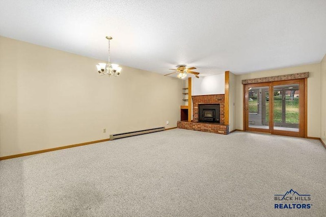 unfurnished living room with baseboard heating, a fireplace, baseboards, and carpet floors