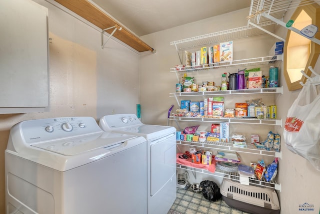 laundry room featuring laundry area and washer and clothes dryer