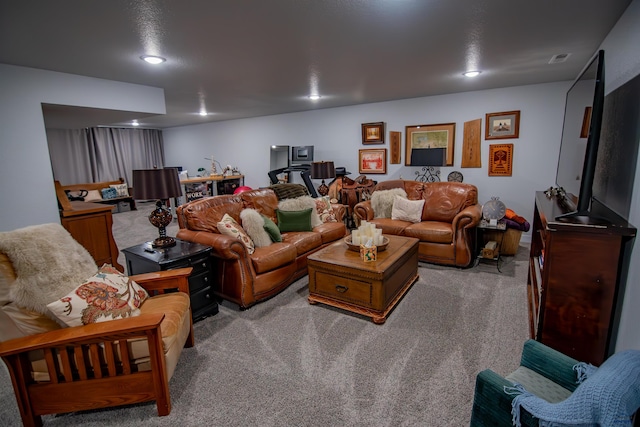 living room with carpet flooring, recessed lighting, and visible vents