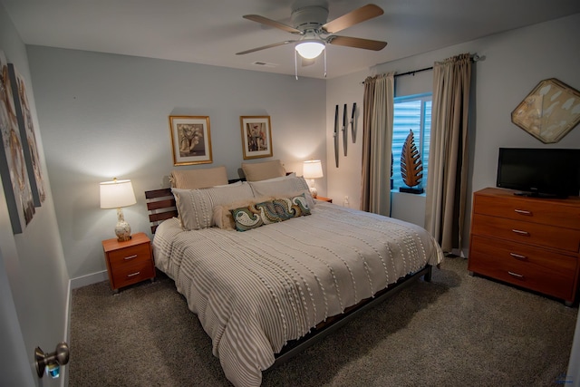 bedroom with dark colored carpet, visible vents, baseboards, and a ceiling fan