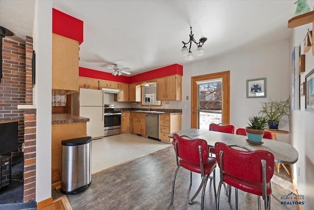 dining space with a ceiling fan