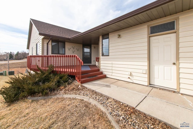 321 Fox Run Dr, Rapid City, SD 57701 - entrance to property featuring a porch and a shingled roof