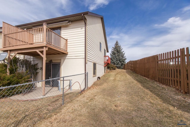 view of property exterior featuring a fenced backyard