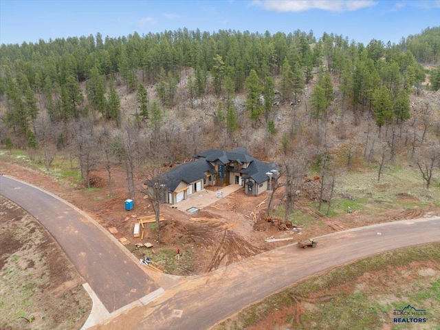 aerial view with a forest view