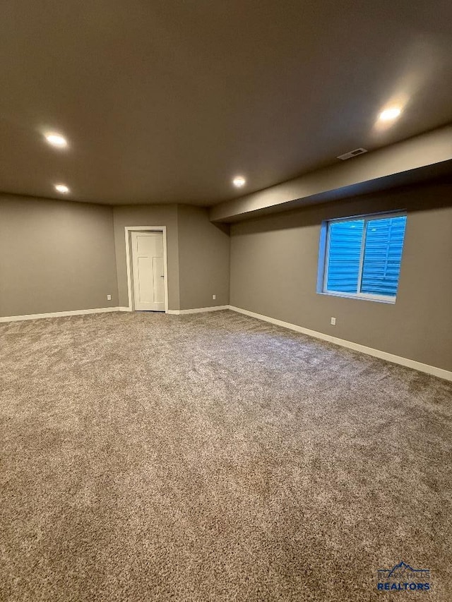 finished basement with recessed lighting, carpet, visible vents, and baseboards