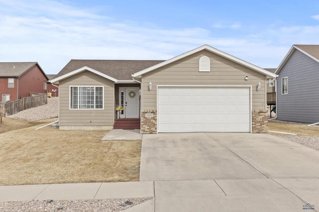 ranch-style house with an attached garage, fence, brick siding, and driveway