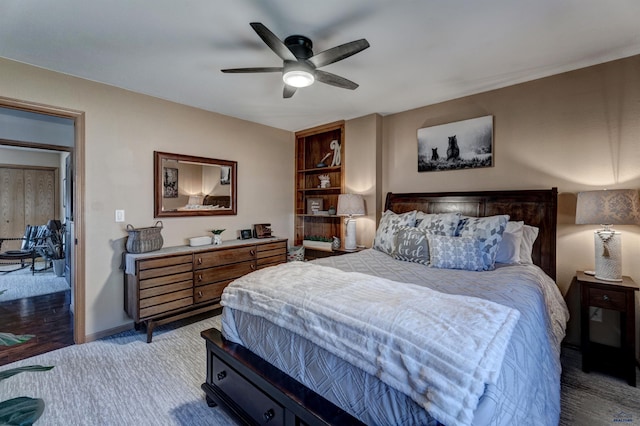 4329 Crooked Oaks Rd, Piedmont, SD 57769 - bedroom with baseboards, light carpet, and ceiling fan