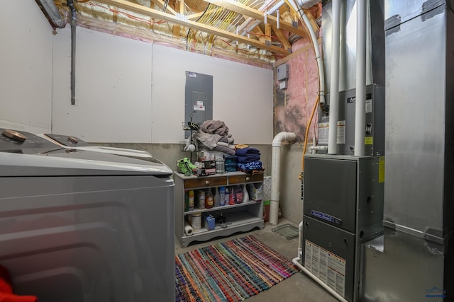 washroom with electric panel, heating unit, and laundry area