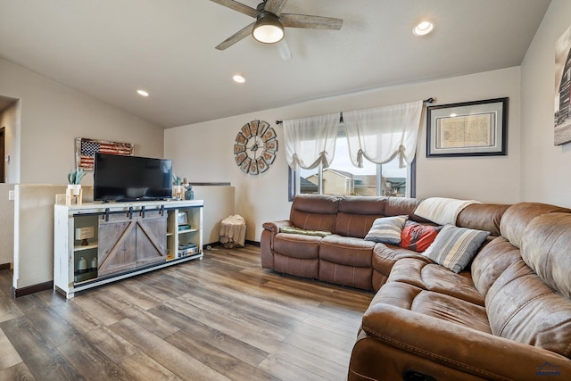 living area featuring recessed lighting, wood finished floors, ceiling fan, and vaulted ceiling