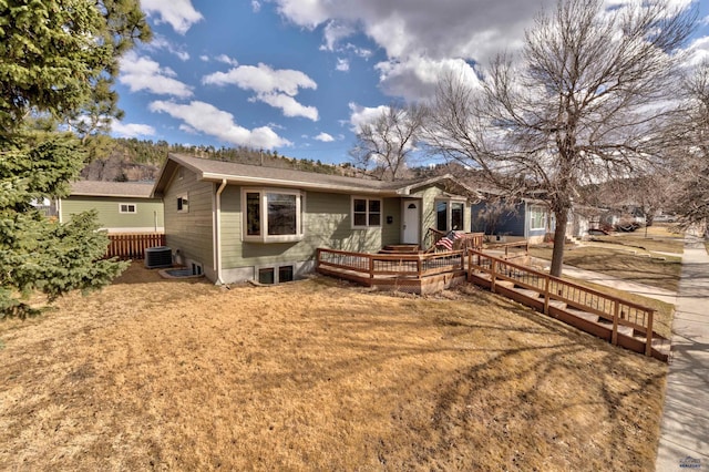 2204 Cruz Dr, Rapid City, SD 57702 - rear view of property featuring cooling unit, a yard, and fence