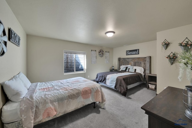 bedroom featuring carpet flooring
