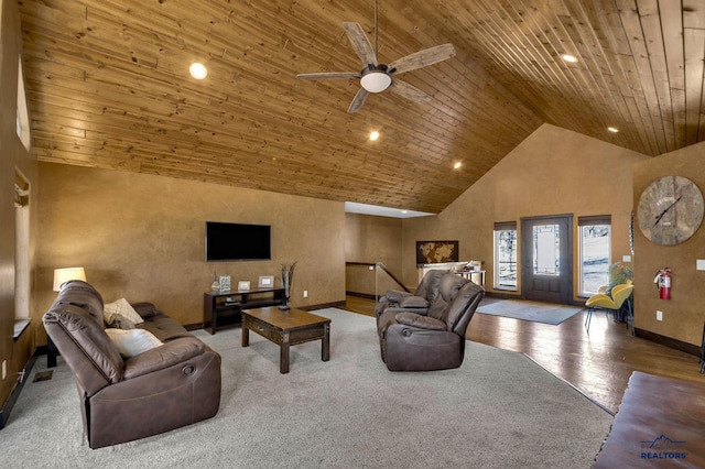 living area with ceiling fan, wooden ceiling, baseboards, and high vaulted ceiling