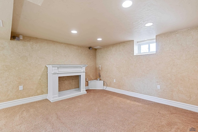 1120 W Blvd, Rapid City, SD 57701 - below grade area featuring recessed lighting, baseboards, and carpet floors