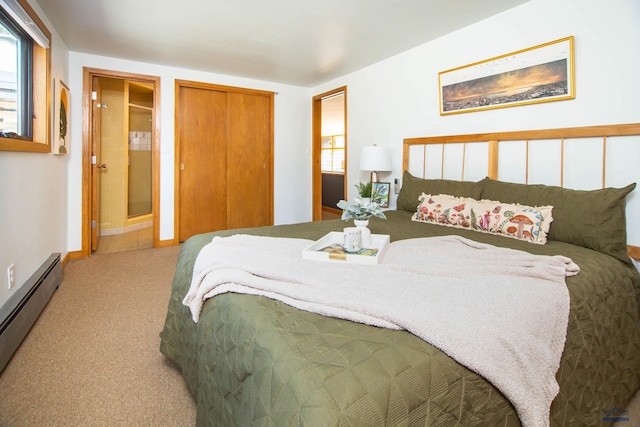 1515 Forest Dr, Rapid City, SD 57701 - carpeted bedroom featuring a baseboard heating unit and connected bathroom