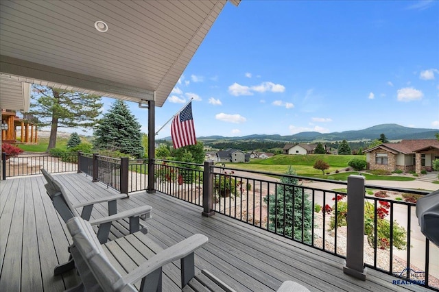 wooden terrace with a mountain view