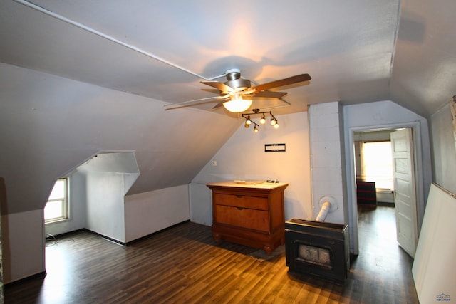 920 Haines Ave, Rapid City, SD 57701 - additional living space with ceiling fan, wood finished floors, a wood stove, and vaulted ceiling