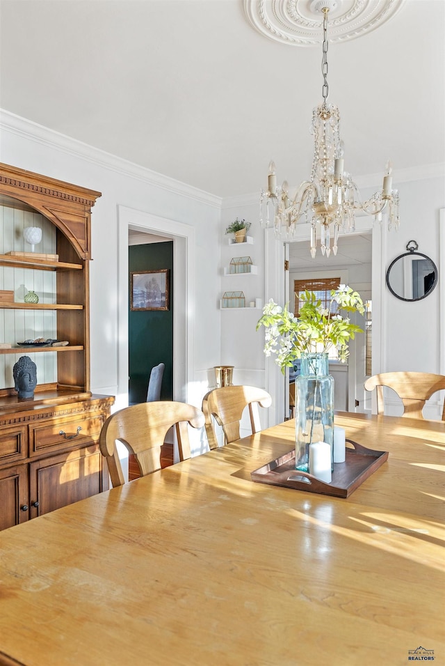 1000 W Blvd, Rapid City, SD 57701 - dining room featuring an inviting chandelier and ornamental molding
