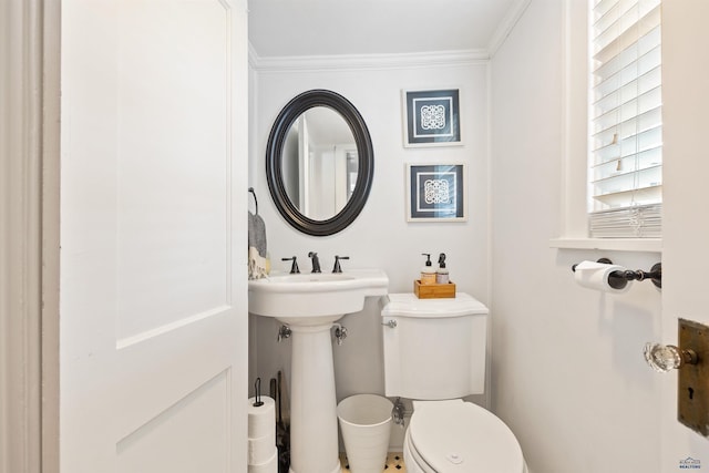 1000 W Blvd, Rapid City, SD 57701 - bathroom featuring crown molding and toilet