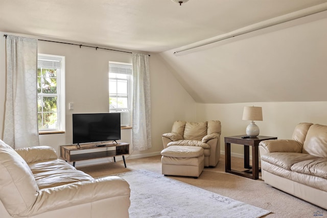 1000 W Blvd, Rapid City, SD 57701 - carpeted living room with a wealth of natural light, baseboards, and vaulted ceiling