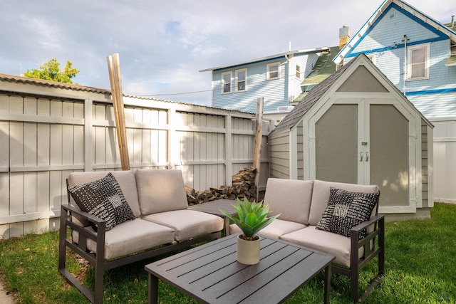 1000 W Blvd, Rapid City, SD 57701 - view of patio with a shed, outdoor lounge area, a fenced backyard, and an outdoor structure