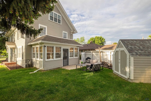 1000 W Blvd, Rapid City, SD 57701 - rear view of house with a yard, a storage shed, an outdoor structure, and fence