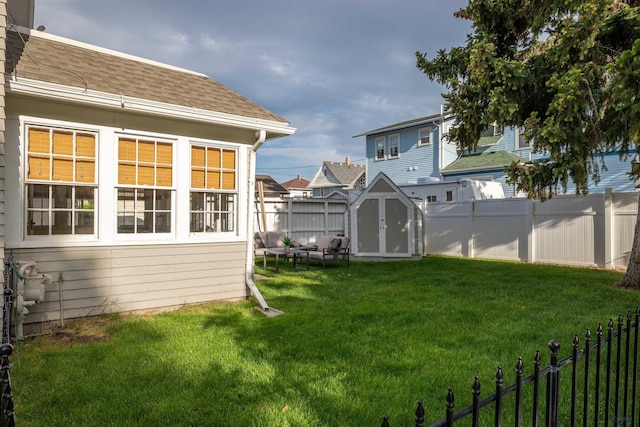1000 W Blvd, Rapid City, SD 57701 - view of yard with an outdoor structure, a fenced backyard, and a shed