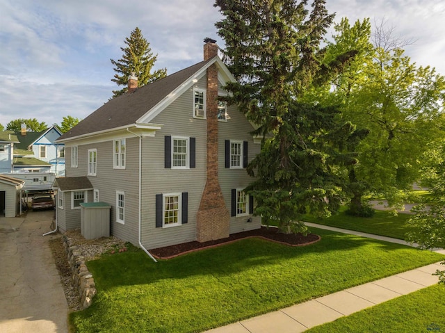 1000 W Blvd, Rapid City, SD 57701 - view of front of house with a front lawn and a chimney