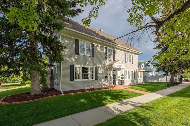 1000 W Blvd, Rapid City, SD 57701 - view of front facade featuring a front yard and fence