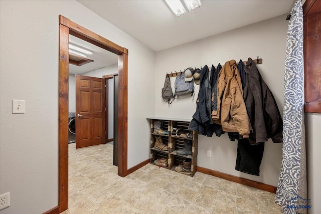 19329 US Highway 85, Belle Fourche, SD 57717 - hallway featuring baseboards and washer / clothes dryer