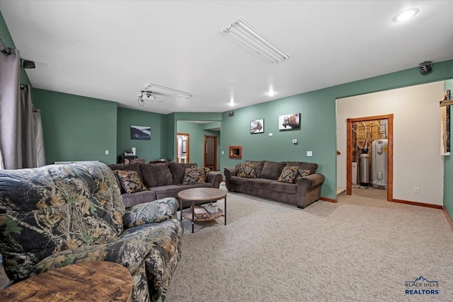 19329 US Highway 85, Belle Fourche, SD 57717 - living area featuring water heater, baseboards, and carpet floors